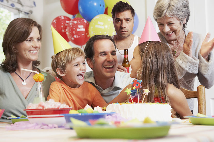 Family celebrating daughter's birthday