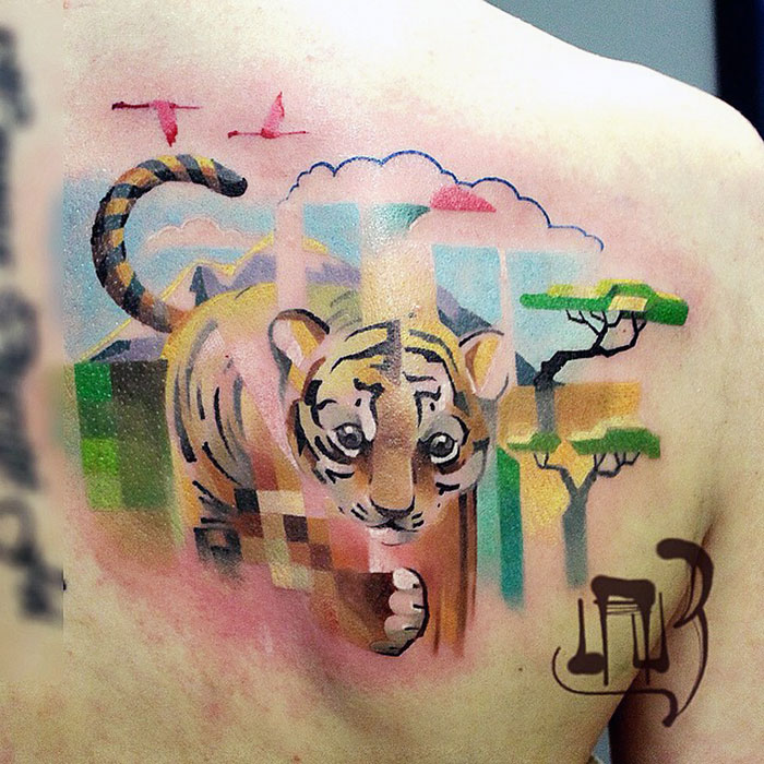 Este artista ruso hace tatuajes de animales con fallos digitales pixelados