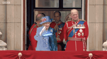 reina-inglaterra-traje-pantalla-verde (1)