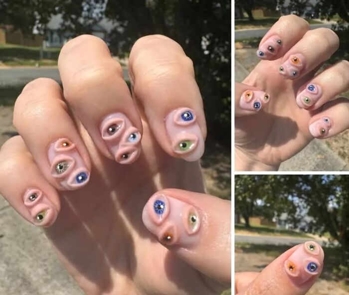 Uñas decoradas con ojos 3D, ejemplo de un fallo DIY extraño y sorprendente en manualidades caseras.