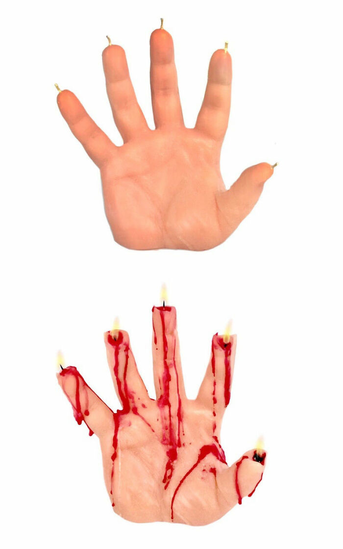 Vela en forma de mano que se desangra lentamente