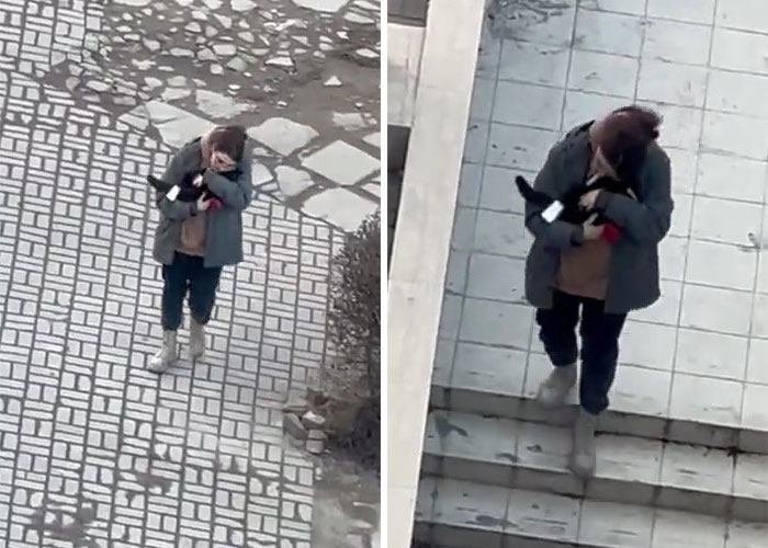 Esta mujer carga con su gato mientras lo consuela ante el sonido de las alarmas de ataque aéreo en Kyiv, Ucrania