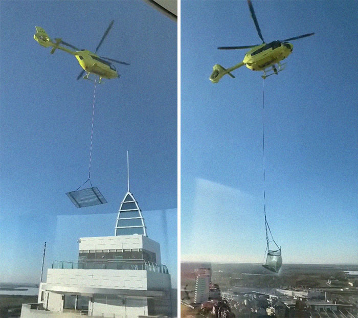 Transporte de un gran panel de vidrio en helicóptero