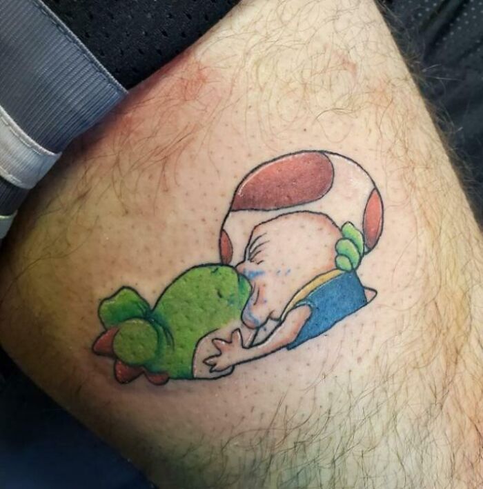 Toad y Yoshi besándose