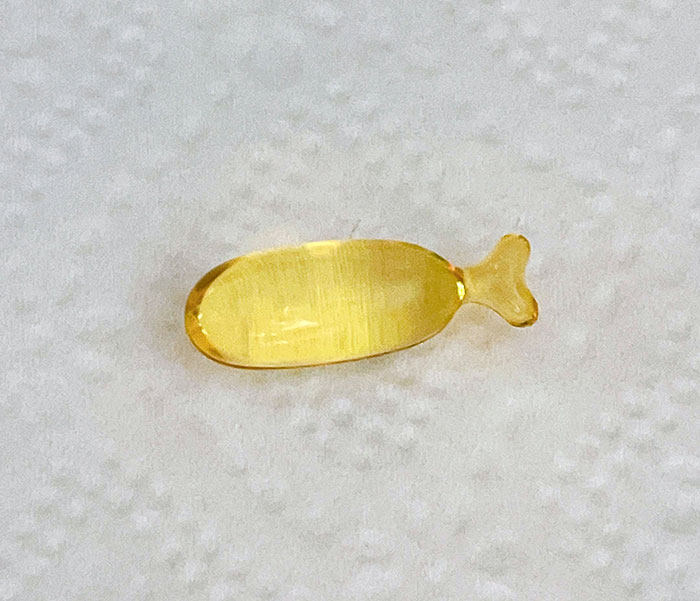 Cápsula de Omega 3 en forma de pez