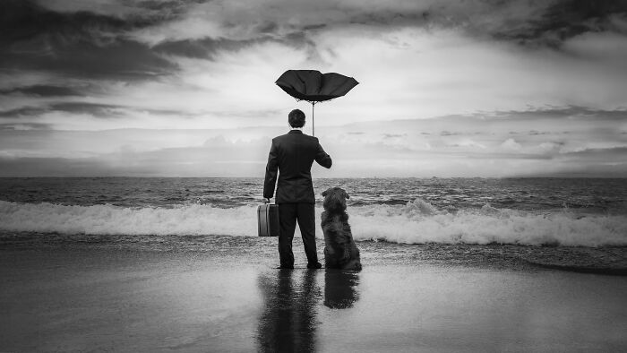 2º puesto categoría Perros y gente: "Afrontando la inmensidad juntos" por Emma Gough