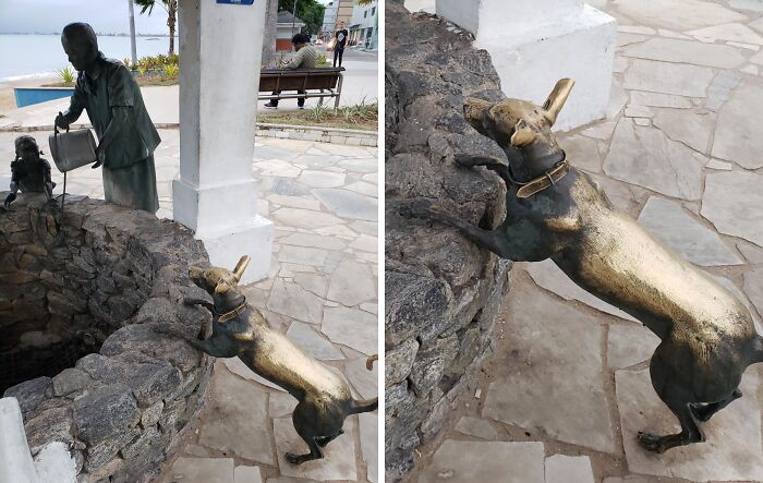Esta estatua de perro está desgastada de tanto acariciarla