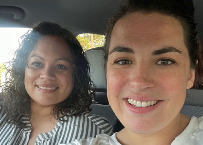 Two friends smiling in a car, sharing their Ozempic experiences.