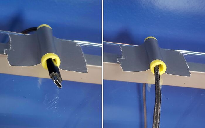 Cable mal reparado con cinta adhesiva en intento de reparación fallida.