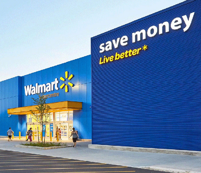 Walmart storefront with customers entering, highlighting a controversy involving a tall cisgender woman.