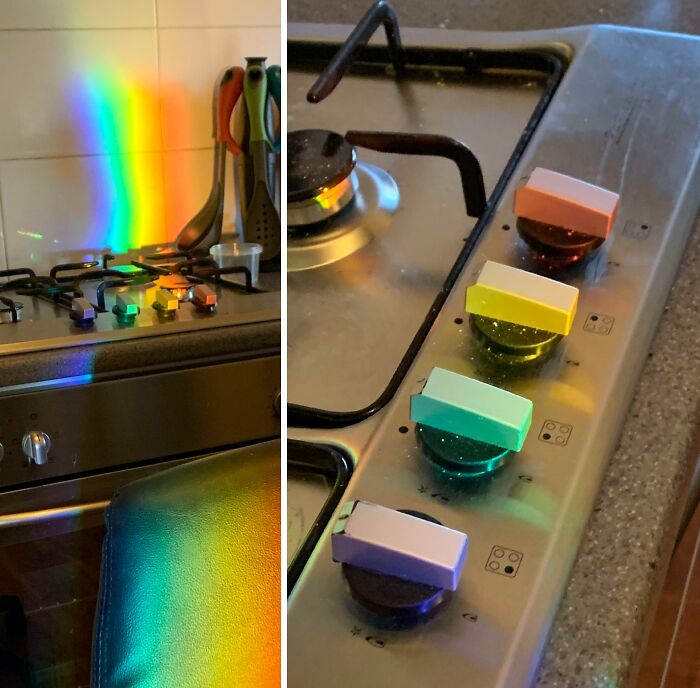Perillas de estufa con colores que coinciden con un arcoíris proyectado, mostrando coincidencias increíbles y poco comunes.