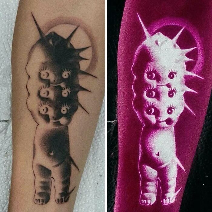 Tatuaje original y extraño con figuras caricaturescas y ojos múltiples, ejemplo de tatuajes que van de lo gracioso a lo terrible.