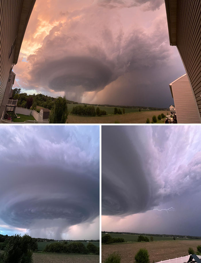 Tormenta amenazante con formación de nube gigante y rayos en campo abierto, una creación de madre naturaleza aterradora.