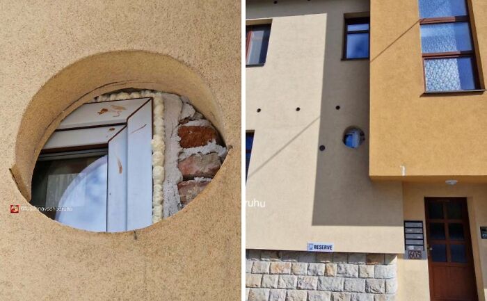 Fallo de construcción con ventana mal instalada y agujero redondo en fachada de edificio residencial.