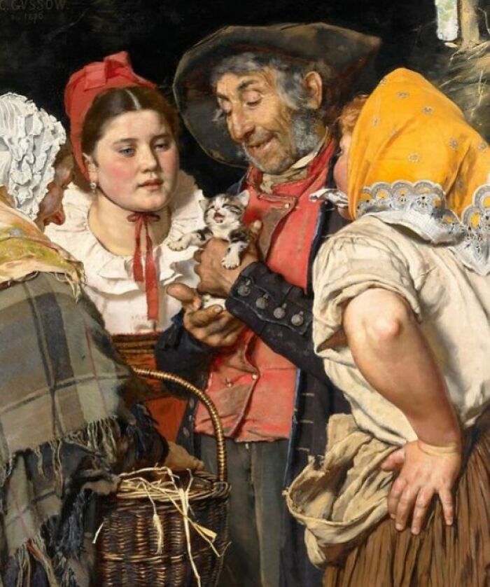 Hombres y mujeres medievales con ropa tradicional observan a un gato pequeño en escena hilarante relacionada con gatos medievales.