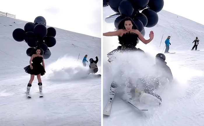 Influencer en vestido negro con globos negros en la nieve, cometiendo una mala elección que causó risas.